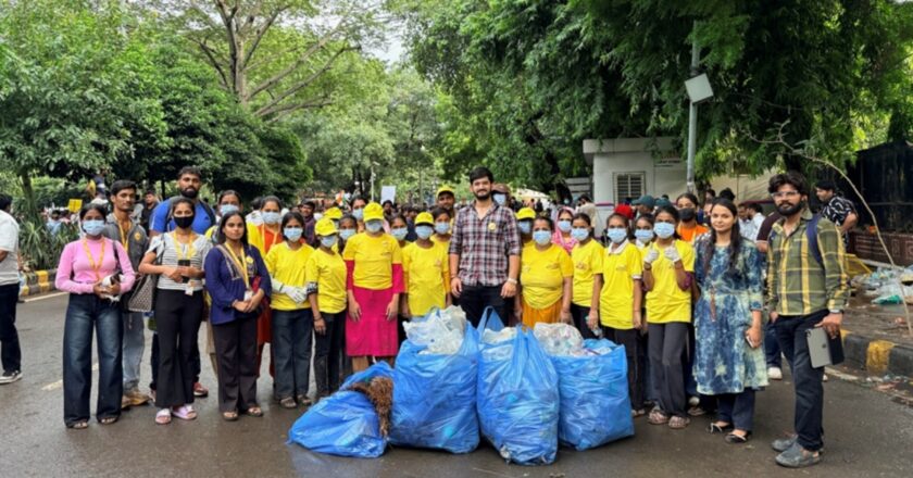 Maid In India Leads Cleanliness Drive at Delhi Protest Site. Yellow T-Shirts, Blue Bags, One Mission.